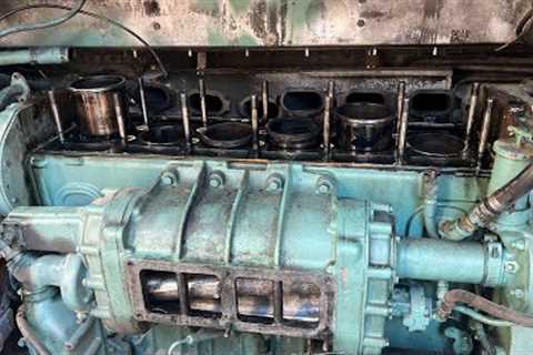 Tearing down a detroit diesel inline 6-71.  No power, low compression, dirty bad  roots blower.