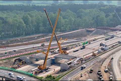 M25/A3 Wisley Junction 10 - New roundabout bridge beam installation by drone in time-lapse x5 speed.