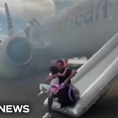 Video shows passengers evacuating American Airlines plane